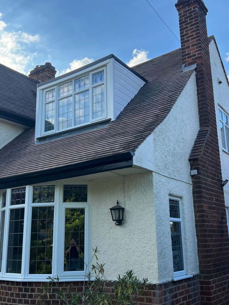 This is a photo of a dormer window which has just had some repairs carried out where the roof and the dormer meet. Works carried out by Hinckley Roofing Repairs